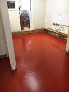 interior-concrete-resurfacing-east-coat-epoxy-red-1